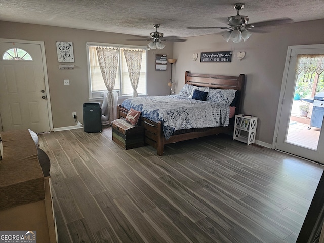 bedroom with ceiling fan, a textured ceiling, access to outside, and wood-type flooring