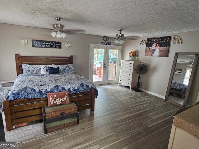 bedroom with french doors, hardwood / wood-style flooring, access to outside, a textured ceiling, and ceiling fan