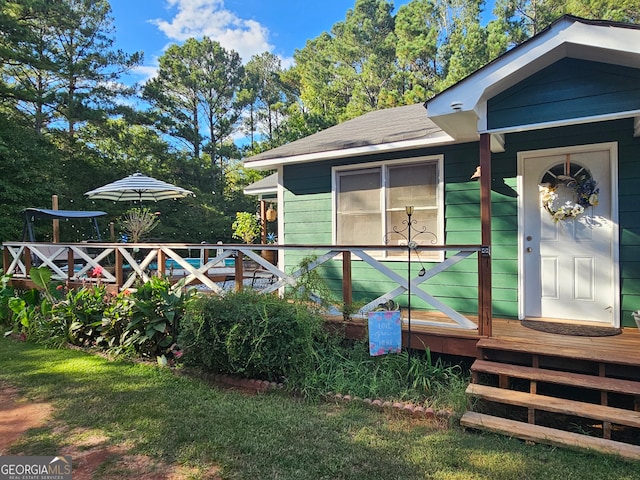 exterior space featuring a deck