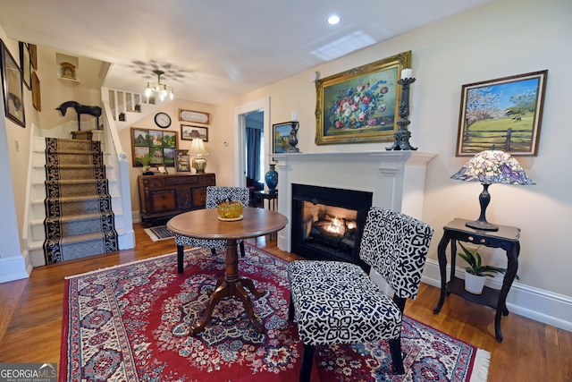 sitting room featuring hardwood / wood-style flooring