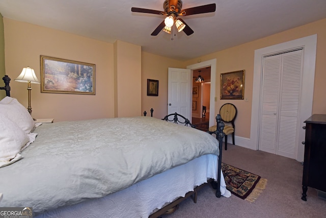 bedroom featuring carpet, a closet, and ceiling fan