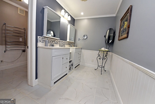 bathroom featuring vanity, decorative backsplash, and ornamental molding