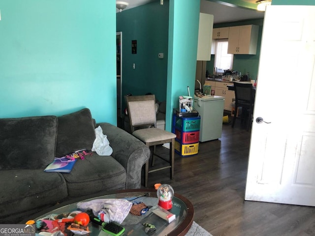 living room featuring dark wood-type flooring