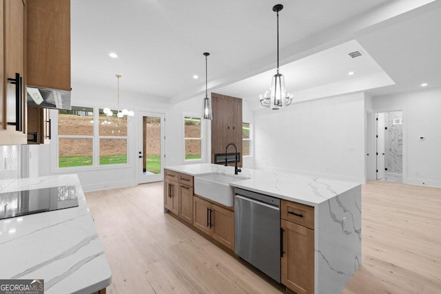 kitchen with sink, dishwasher, light hardwood / wood-style flooring, and decorative light fixtures