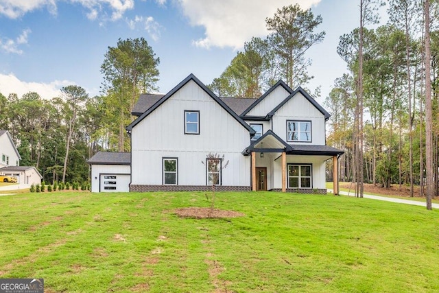 modern farmhouse style home featuring a porch, a front lawn, and a garage