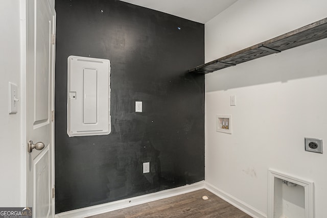 laundry room featuring hookup for a washing machine, dark hardwood / wood-style floors, and electric dryer hookup