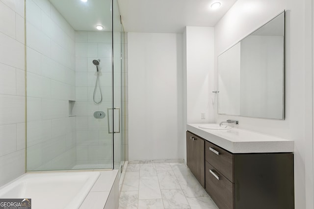 bathroom with recessed lighting, a tile shower, a bathing tub, marble finish floor, and vanity