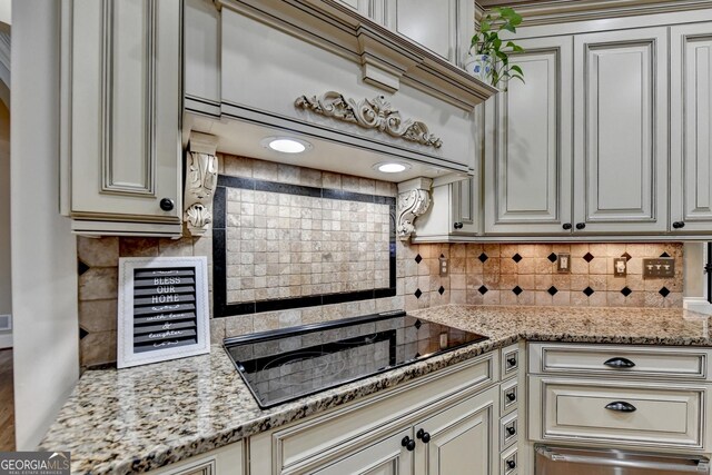 kitchen featuring sink, light hardwood / wood-style flooring, and plenty of natural light