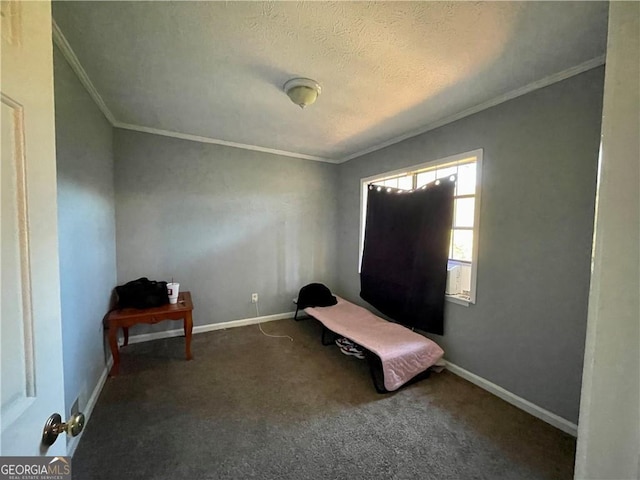 300 Flagstone Way, Austell, GA 30168 - unfurnished bedroom featuring crown molding, carpet, baseboards, and a textured ceiling