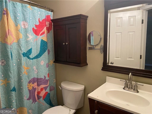 300 Flagstone Way, Austell, GA 30168 - full bathroom featuring toilet, vanity, and a shower with curtain