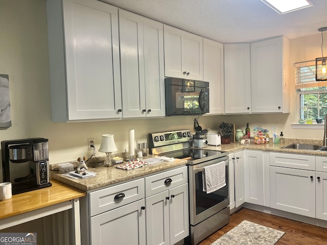 kitchen featuring stainless steel electric range, white cabinets, sink, and dark hardwood / wood-style flooring