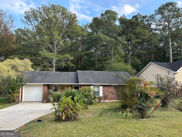 ranch-style home with a garage and a front lawn