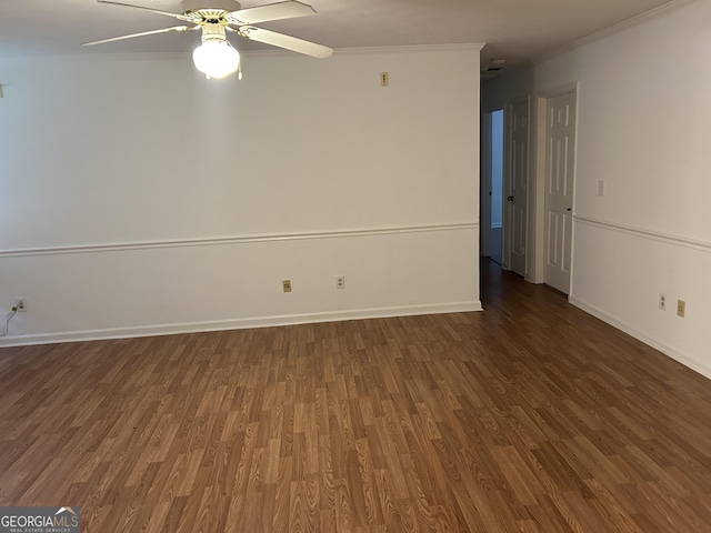 unfurnished room with ceiling fan, ornamental molding, and dark hardwood / wood-style floors