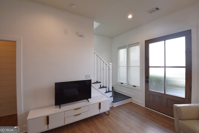 foyer entrance with light wood-type flooring