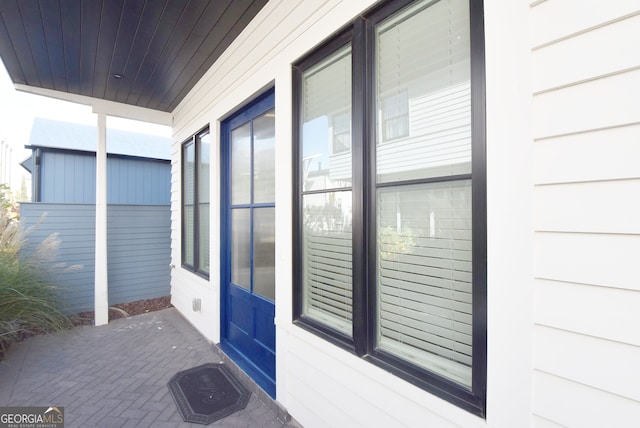 entrance to property with a patio