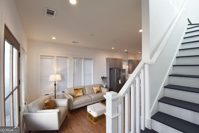 living room with hardwood / wood-style flooring