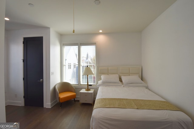 bedroom featuring dark hardwood / wood-style floors