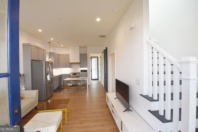 living room featuring light wood-type flooring