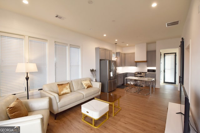 living room with light wood-type flooring