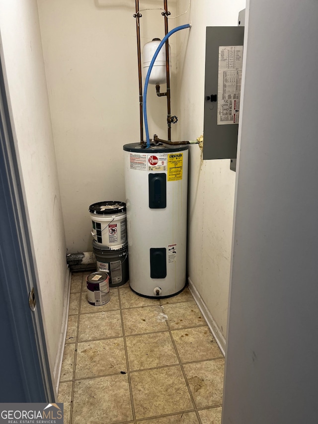 utility room featuring electric water heater