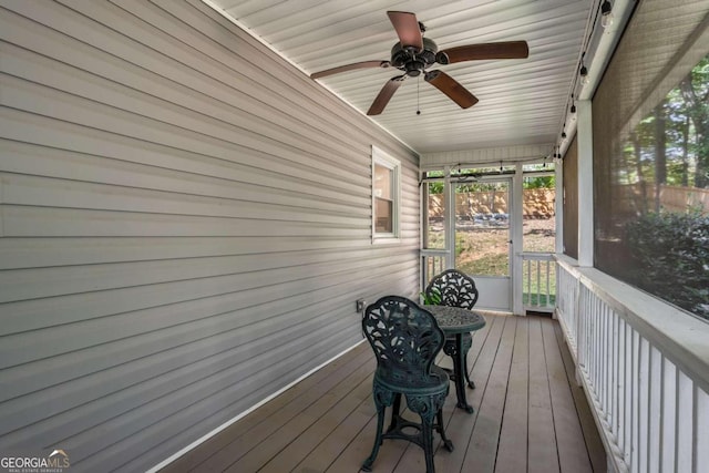 unfurnished sunroom featuring wooden ceiling