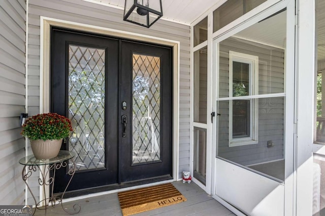 property entrance featuring french doors