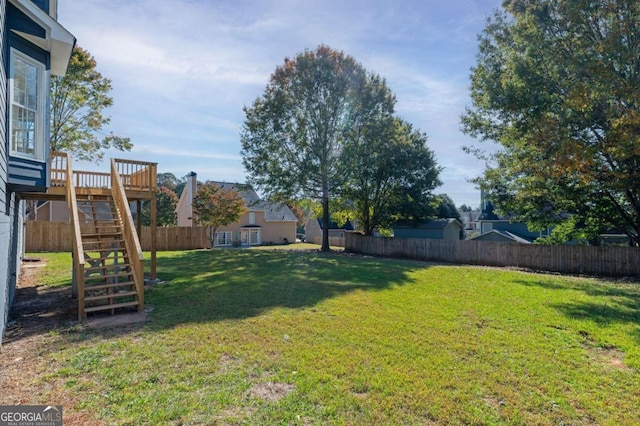 view of yard featuring a deck