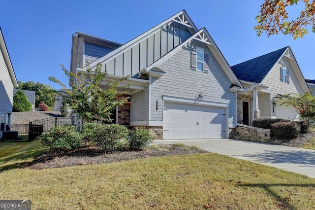 view of front facade featuring a front yard and a garage