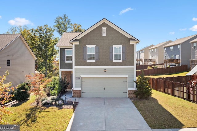 view of front property featuring a garage and a front lawn