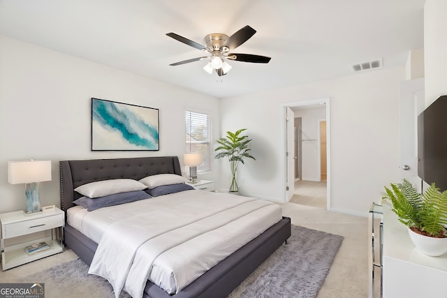 carpeted bedroom with ceiling fan