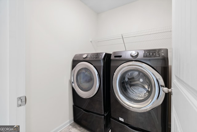 washroom featuring separate washer and dryer