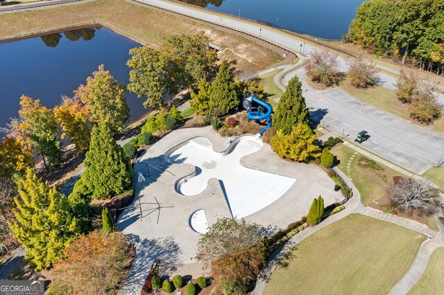 bird's eye view with a water view