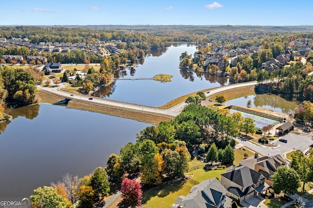 drone / aerial view featuring a water view