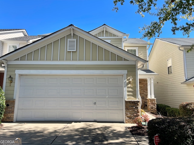 view of front of property with a garage