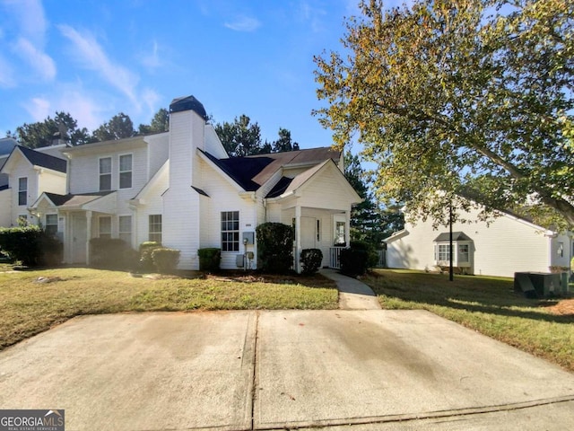 view of property featuring a front yard