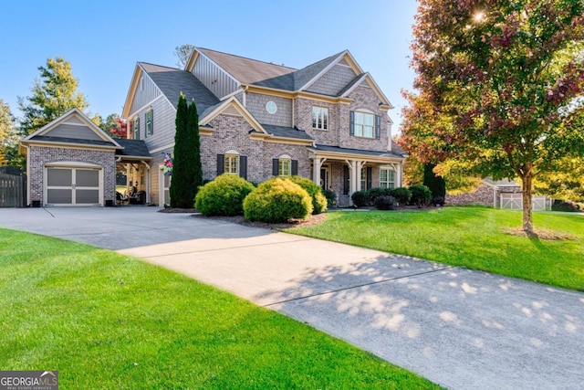 view of front of home featuring a garage and a front lawn