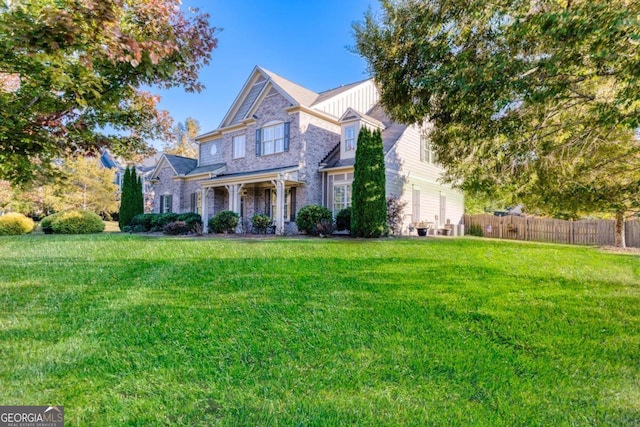 view of front of property with a front lawn