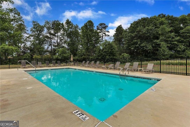 view of pool with a patio area