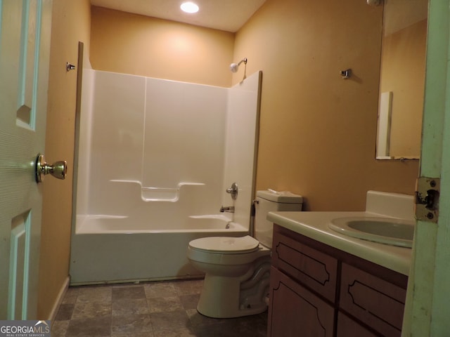 full bathroom with vanity, shower / washtub combination, and toilet