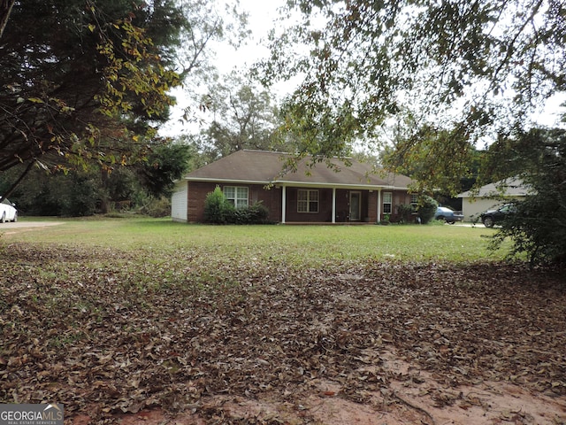 view of front of home with a front yard