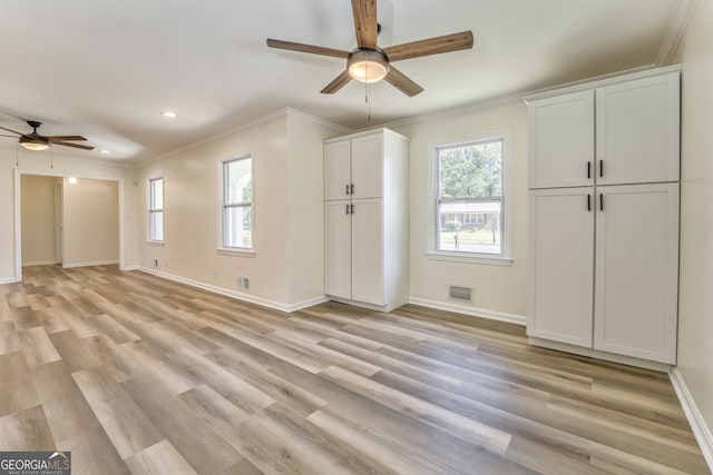 interior space featuring light hardwood / wood-style floors and plenty of natural light