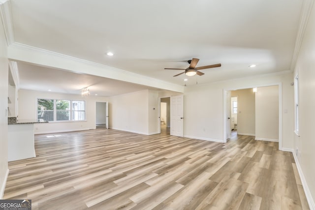 unfurnished living room with crown molding, light hardwood / wood-style flooring, and ceiling fan