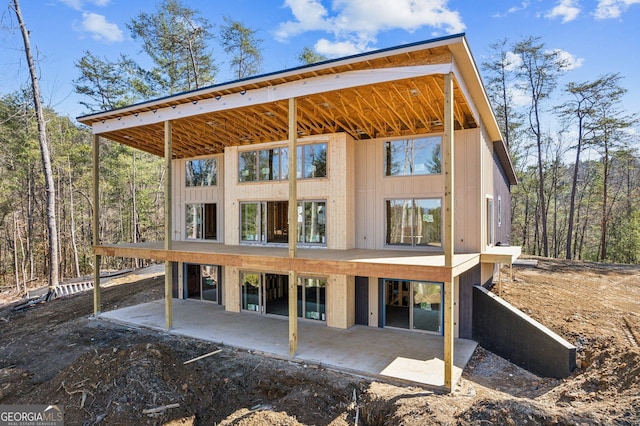 rear view of house with a patio