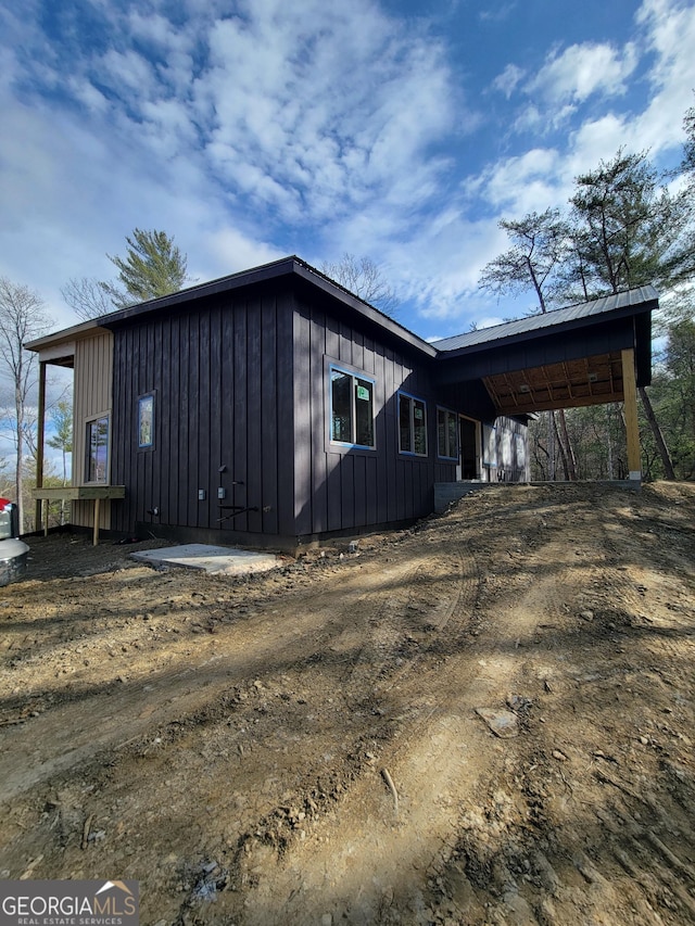1713 Old Northcutt Rd Tr B, Unit Tr B, Ellijay, GA 30540 - view of side of home featuring board and batten siding and a carport