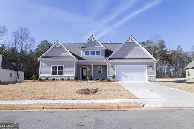 craftsman-style home featuring a garage