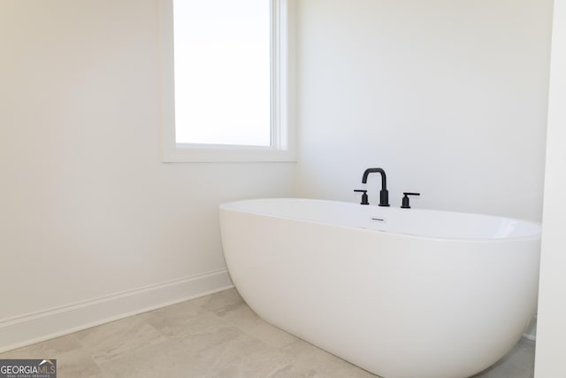 bathroom with a bathing tub