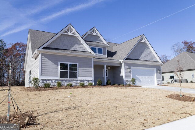 craftsman-style house featuring a garage