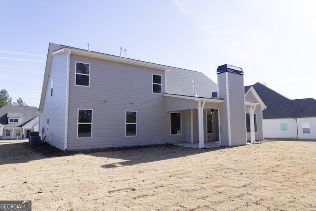 back of house with a patio