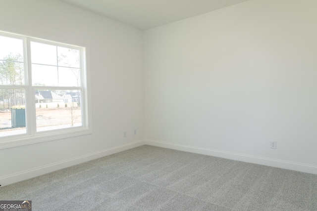 empty room with carpet flooring