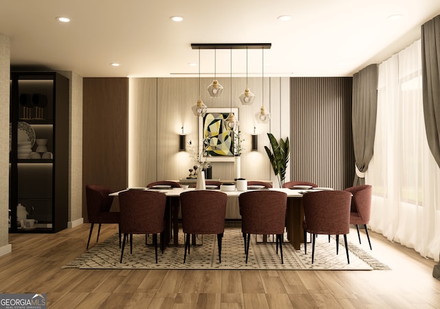 dining area featuring wood-type flooring